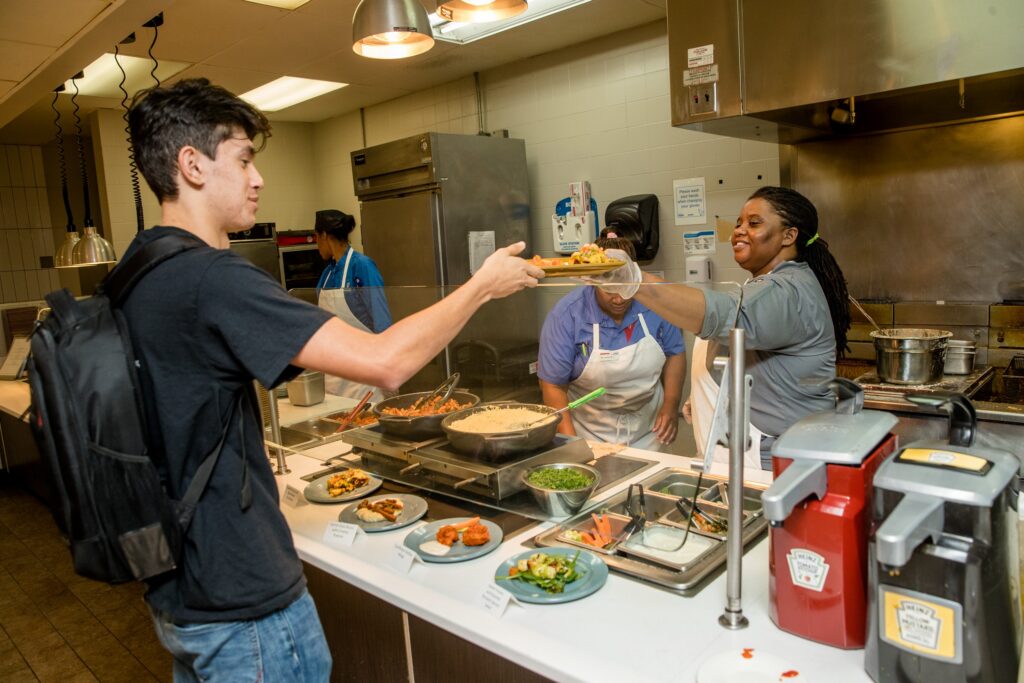 At USM’s renovated Brooks Dining Hall, vegans will eat better Student in service line